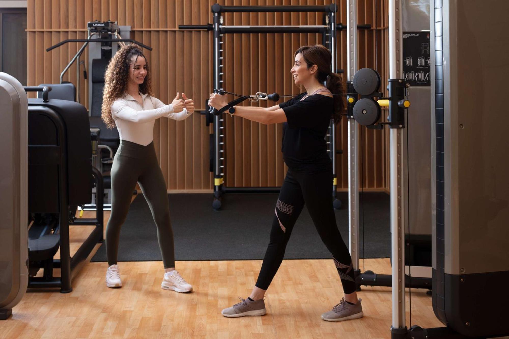 Hyatt Regency Riyadh Olaya Exterior foto Personal trainer working with a female client
